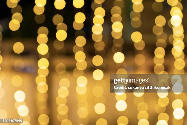 round bokeh golden lights efect,abstract light concept. - disco ball stock-fotos und bilder