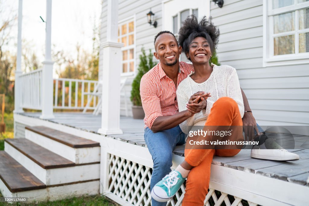 Couple in love hanging out on the porch