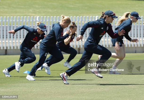 England players warm up during an England Women's training session at Junction Oval on February 05, 2020 in Melbourne, Australia.
