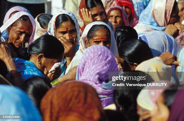 Group of women during a funeral ceremony in Nasik, Mahrashtra, India - Nasik is traversed by the Godavari, the most sacred river of the Deccan. The...