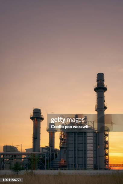 gas turbine electrical power plant in industrial estate. power plant at sunset. - gas turbine electrical power plant stock pictures, royalty-free photos & images