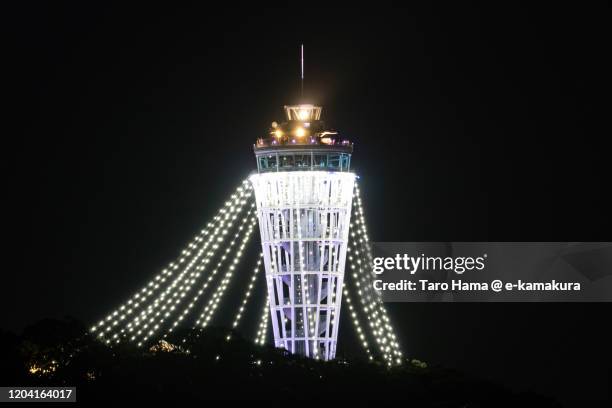 illuminated lighthouse in kanagawa prefecture of japan - enoshima island stock pictures, royalty-free photos & images