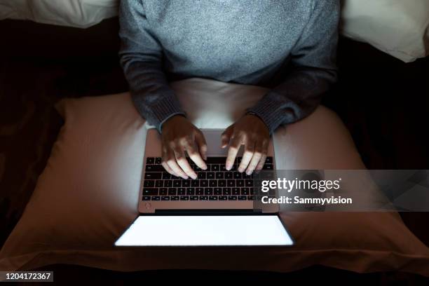 working late - zoom fatigue stock pictures, royalty-free photos & images