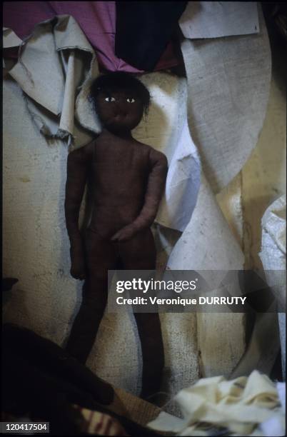 Black Doll In A Little Tailors Shop In Brazzaville, Congo.