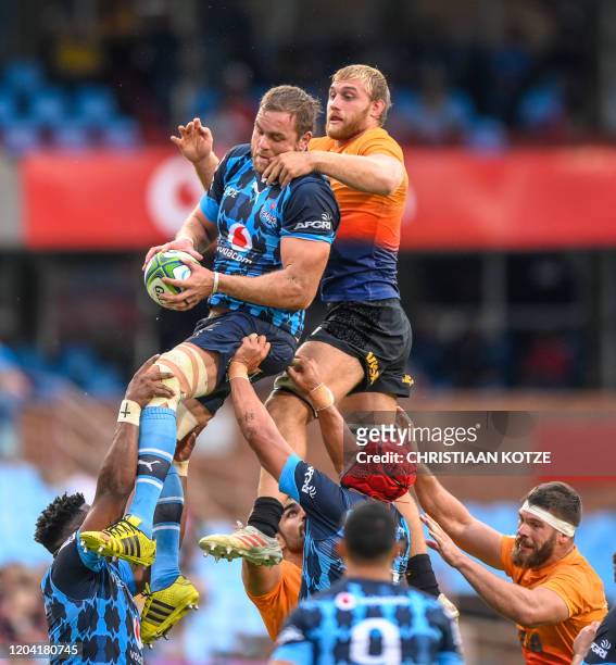 The Vodacom Bulls' Andries Ferreira and The Visa Jaguares' Francisco Gorrissen jump for the ball during the Super rugby match Vodacom Bulls v Visa...