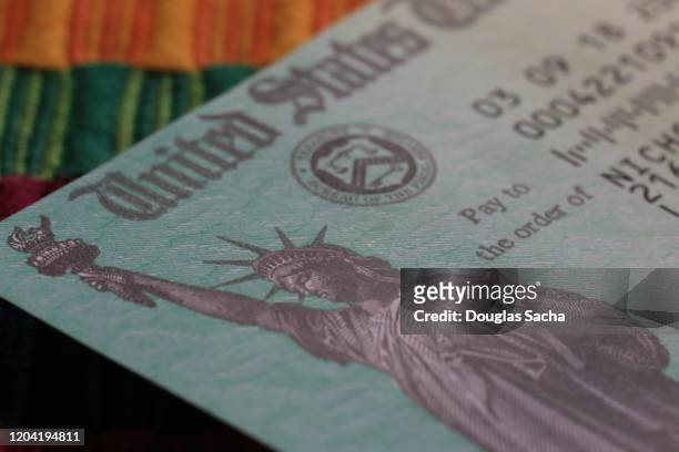 us treasury federal tax return check - tax season stock pictures, royalty-free photos & images