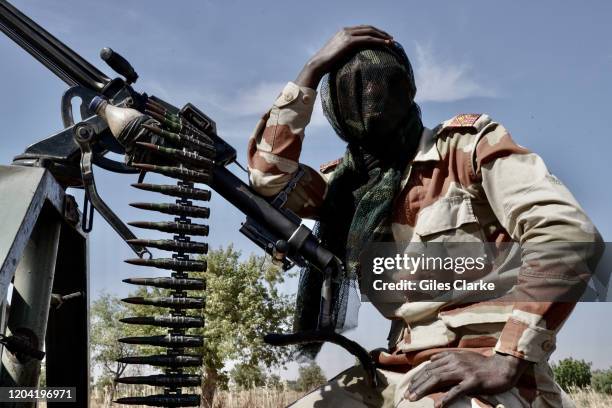 Maradi State, Niger.December 12, 2019. Niger Army soldier takes a breather during security patrol near the Nigerian border in Maradi State. The...