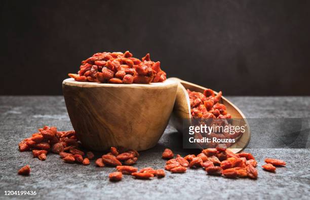 red dried goji berries - goji berry stock pictures, royalty-free photos & images