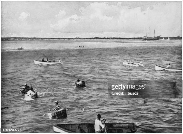 antique photograph of the british empire: tub race in the bahamas - boat in bath tub stock illustrations