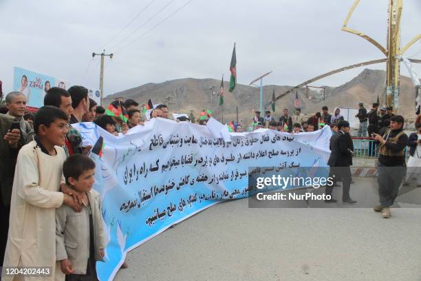 Afghan people show their support for peace and permanent ceasefire by road walking in Badakhshan, Afghanistan on February 29, 2020.