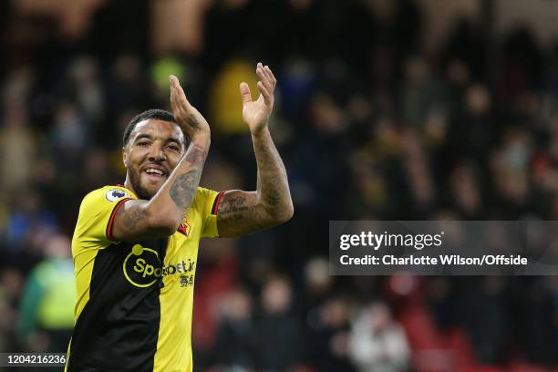Troy Deeney of Watford celebrates their 3-0 victory over Liverpool during the Premier League match between Watford FC and Liverpool FC at Vicarage...