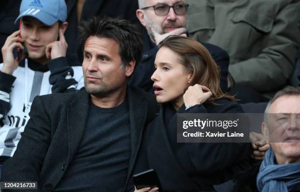 Fabrice Santoro and his girlfriend attend the Ligue 1 match between Paris Saint-Germain and Dijon FCO at Parc des Princes on February 29, 2020 in...