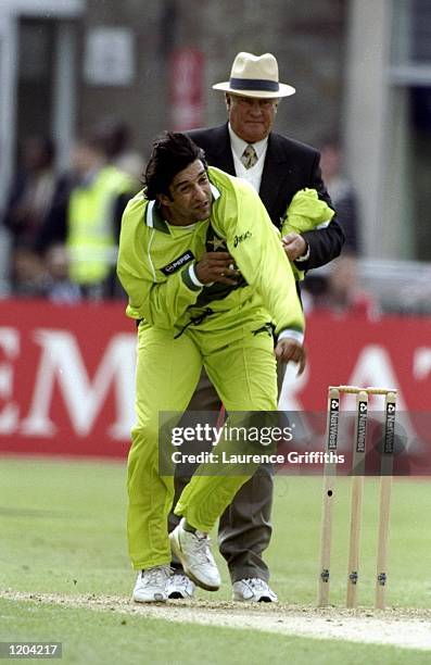 Wasim Akram of Pakistan bowls during the Cricket World Cup Group B match against the West Indies played in Bristol, England. Pakistan won the game by...