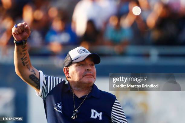 Diego Armando Maradona head coach of Gimnasia y Esgrima La Plata gestures to supporters during a match between Gimnasia y Esgrima La Plata and...