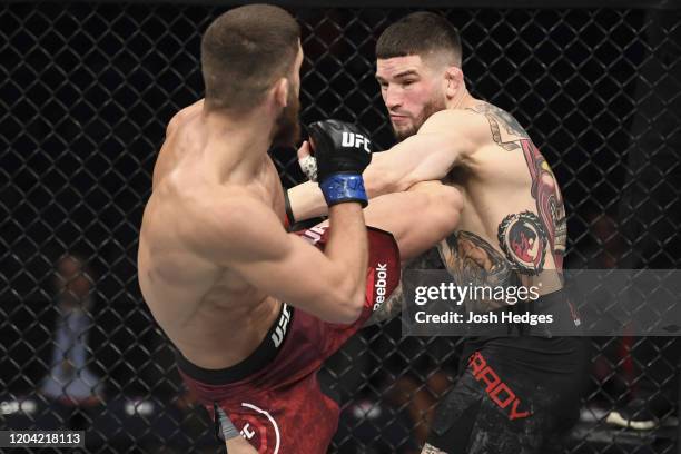 Ismail Naurdiev kicks Sean Brady in their welterweight bout during the UFC Fight Night event at Chartway Arena on February 29, 2020 in Norfolk,...