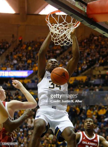 Oscar Tshiebwe of the West Virginia Mountaineers dunks against the Oklahoma Sooners at the WVU Coliseum on February 29, 2020 in Morgantown, West...