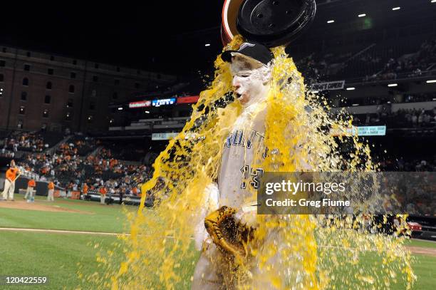 Brett Lawrie of the Toronto Blue Jays is doused with Powerade after a 5-4 Toronto victory in his major league debut against the Baltimore Orioles at...