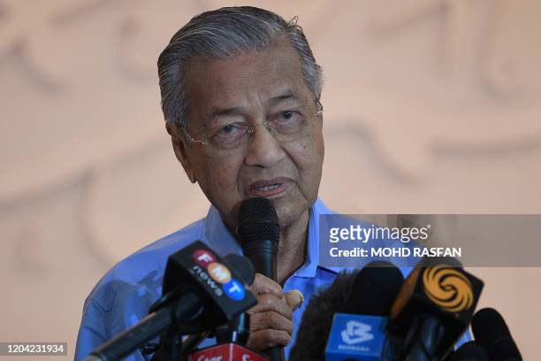 Malaysia's interim Prime Minister Mahathir Mohamad speaks during a press conference in Kuala Lumpur on March 1 after Muhyiddin Yassin was appointed...