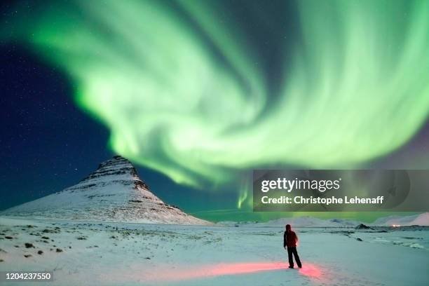 northern lights from the kirkjufell, in iceland, during winter - snaefellsnes stock pictures, royalty-free photos & images