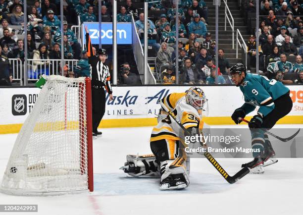 Evander Kane of the San Jose Sharks scores against Tristan Jarry of the Pittsburgh Penguins at SAP Center on February 29, 2020 in San Jose,...