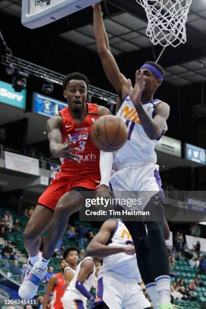 Antonius Cleveland of the Texas Legends passes the ball against Tariq Owens of the Northern Arizona Suns during the first quarter on February 29,...