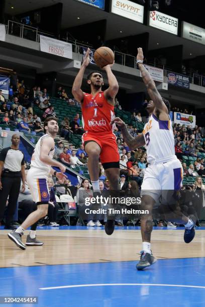 Cameron Payne of the Texas Legends shoots over Ahmed Hill of the Northern Arizona Suns during the second quarter on February 29, 2020 at Comerica...
