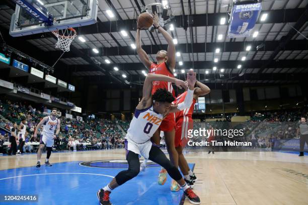 Moses Brown of the Texas Legends grabs a rebound over Jalen Lecque of the Northern Arizona Suns during the second quarter on February 29, 2020 at...