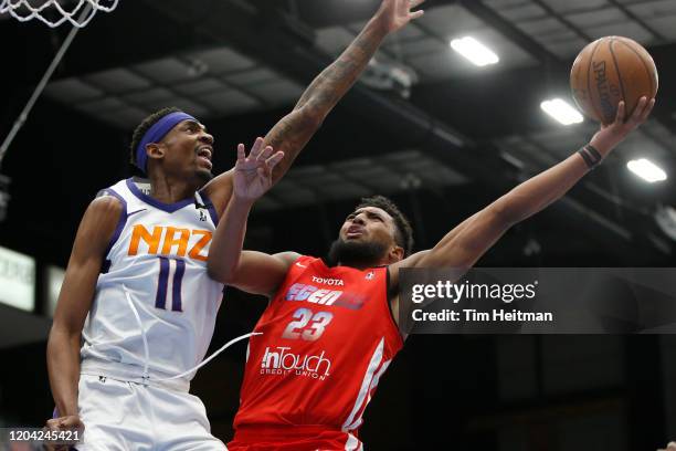 Josh Reaves of the Texas Legends drives against Tariq Owens of the Northern Arizona Suns during the first quarter on February 29, 2020 at Comerica...