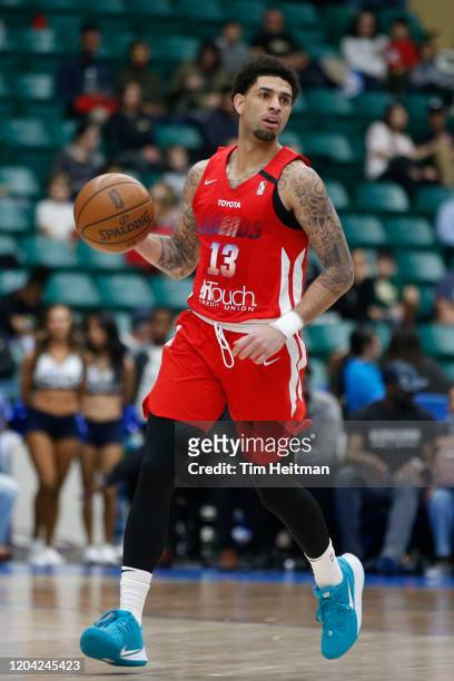 Josh Perkins of the Texas Legends dribbles up court during the first quarter against the Northern Arizona Suns of the Texas Legends on February 29,...