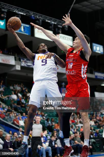Ahmed Hill of the Northern Arizona Suns shoots against Yudai Baba of the Texas Legends during the third quarter on February 29, 2020 at Comerica...