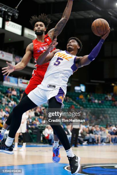 Anthony Lawrence of the Northern Arizona Suns drives against Isaac Copeland of the Texas Legends during the fourth quarter on February 29, 2020 at...