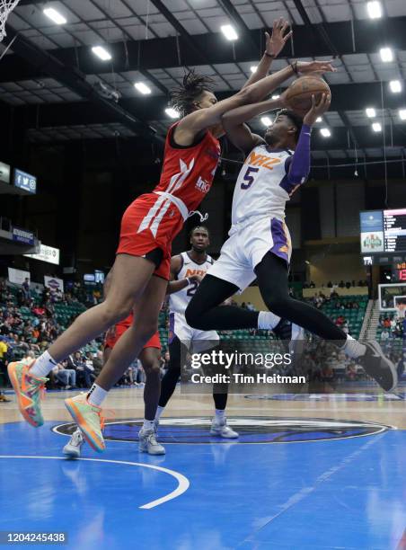 Anthony Lawrence of the Northern Arizona Suns shot is blocked by Moses Brown of the Texas Legends on February 29, 2020 at Comerica Center in Frisco,...