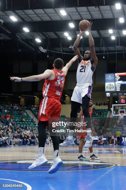 Aaron Epps of the Northern Arizona Suns shoots over Dakota Mathias of the Texas Legends during the fourth quarter on February 29, 2020 at Comerica...