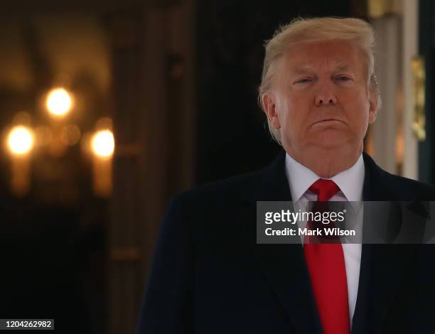 President Donald Trump waits with Interim President of the Bolivarian Republic of Venezuela, after his arrival at the White House, on February 5,...