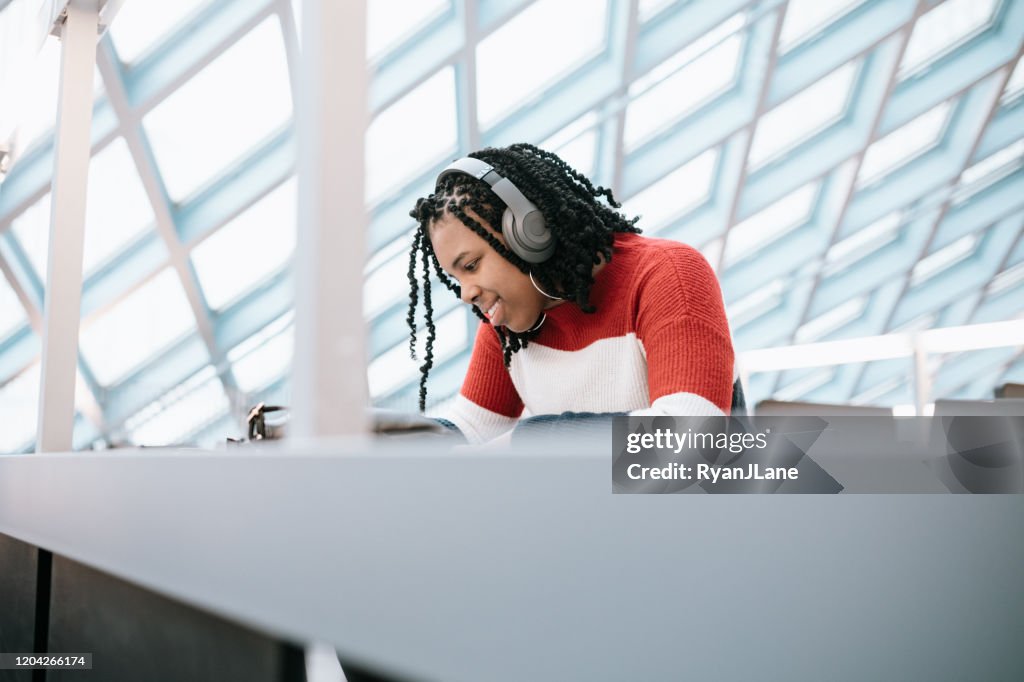 Student Researching and Studying at Library