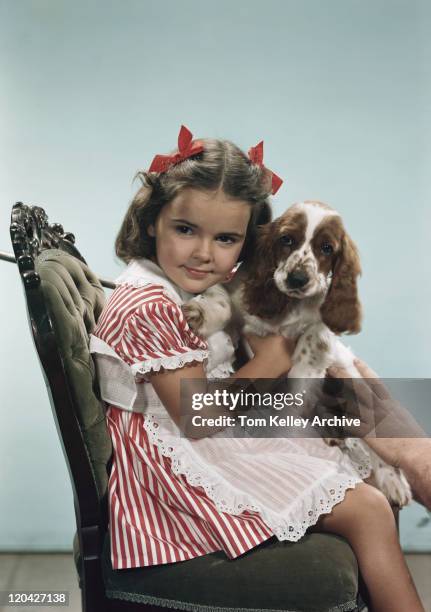 girl sitting with dog on chair, smiling - 1948 stock pictures, royalty-free photos & images