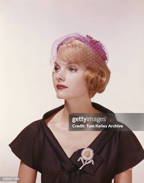 young woman wearing netted hat, close-up - 1950s fashion stock pictures, royalty-free photos & images