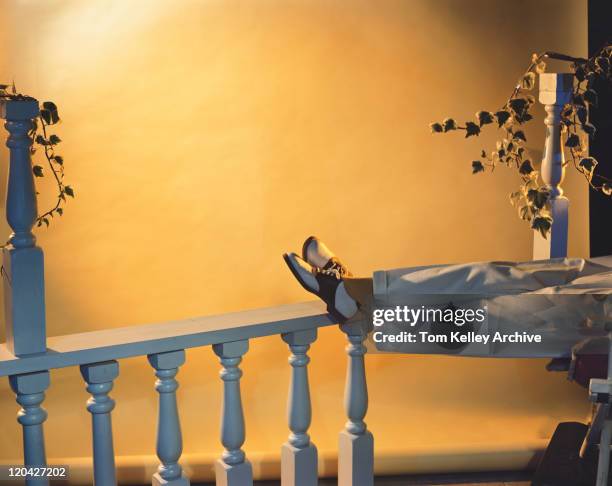 Resting On Railing The Crossed Feet Photos and Premium High Res Pictures - Getty Images