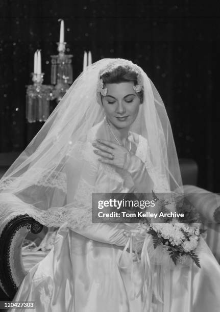 woman sitting in wedding dress - veil stock pictures, royalty-free photos & images
