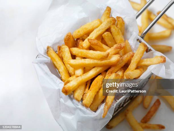 air fried, crispy french fries - fried stock pictures, royalty-free photos & images