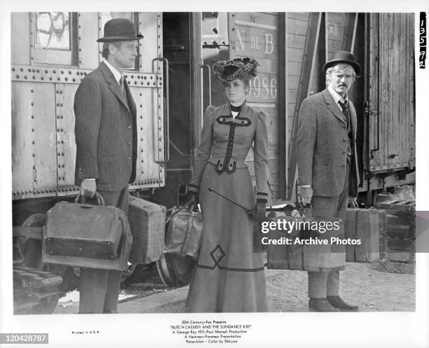 Paul Newman, Katharine Ross, and Robert Redford get off train in a scene from the film 'Butch Cassidy And The Sundance Kid', 1969.