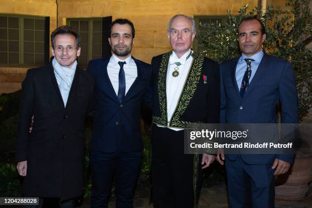 Frederic Mitterrand standing between his sons Mathieu Mitterrand, Jihed Gasmi-Mitterrand and Said Kasmi-Mitterrand attend the Installation of...