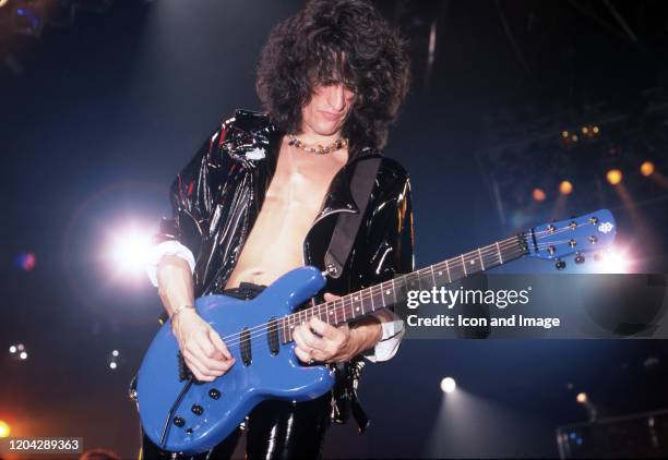 Aerosmith lead guitarist Joe Perry performs during the band's Permanent Vacation Tour on December 5 at the Joe Louis Arena in Detroit, Michigan.