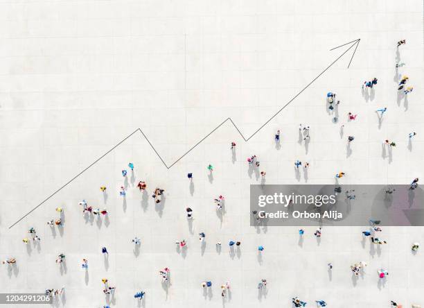 crowd from above forming a growth graph - healthcare data stock pictures, royalty-free photos & images