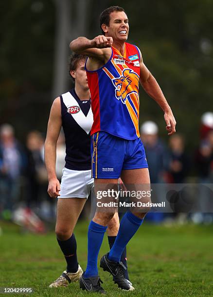 Wayne Carey playing for the Maribyrnong Lions hobbles to the boundary after suffering an injury during the Essendon Distrct Football League AFL match...