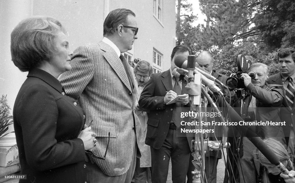 Randolph Hearst and wife Catherine Hearst hold a press conference outside their house in Hillsborough, and the kidnapping of Patty Hearst , February 11, 1974