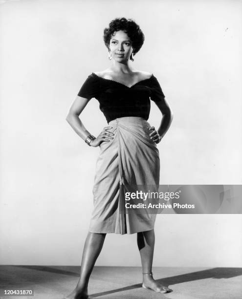 Dorothy Dandridge strikes a pose in a scene from the film 'Carmen Jones', 1954.