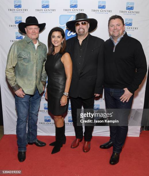 Tracy Lawrence, Angie Gentry, Eddie Montgomery and Storme Warren attend C'Ya On The Flip Side: The Troy Gentry Foundation event at The Grand Ole Opry...