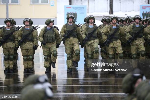 Russian paratroopers march during the military parade at the 76th Guards Air Assault Division in Pskov, Russia, March 2020. Putin is having a one-day...