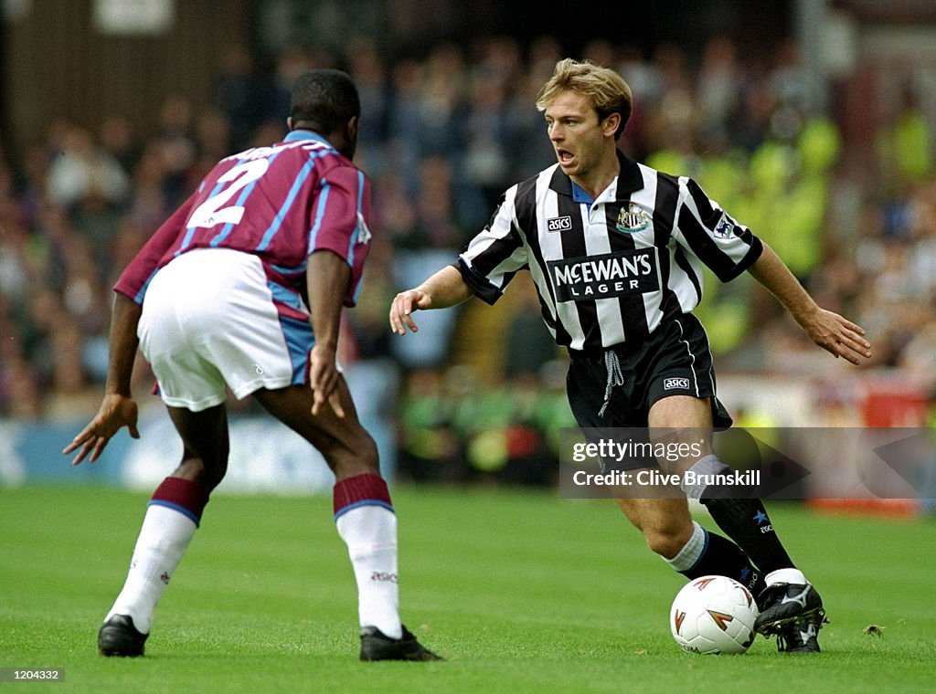 John Beresford of Newcastle United and Earl Barrett of Aston Villa